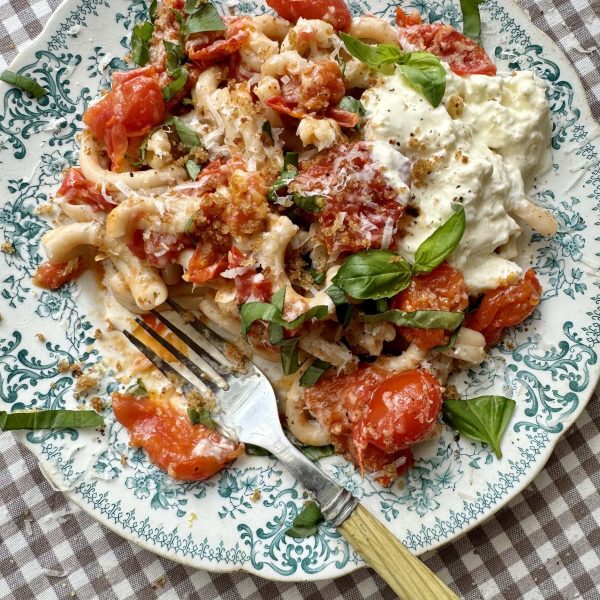 cherry pasta pasta sauce on a blue floral plate