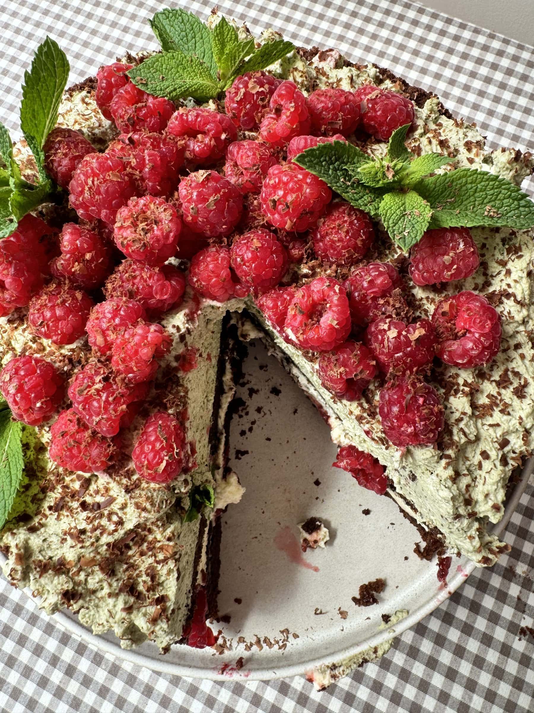 top down view of chocolate raspberry cake with slice out