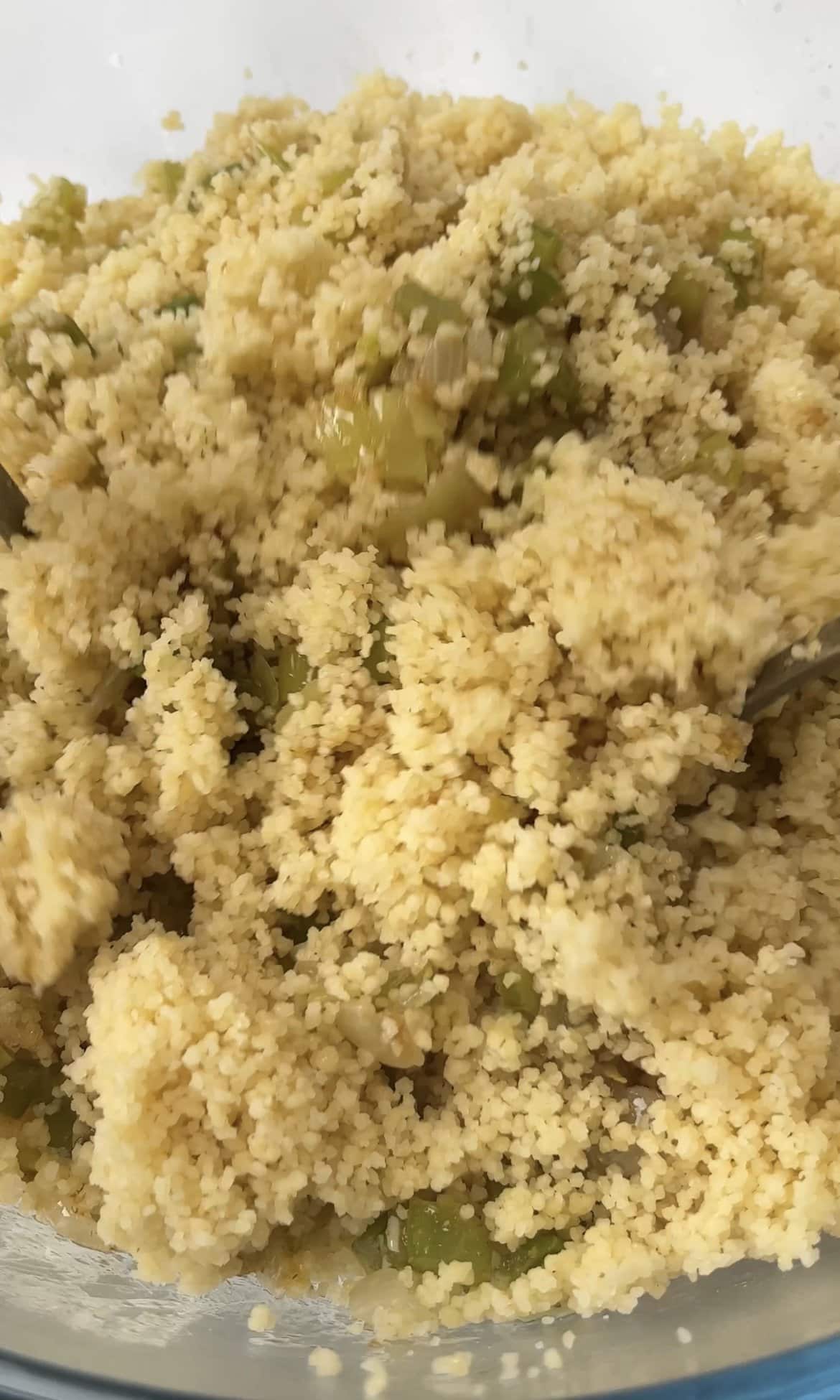 fluffing up the couscous.