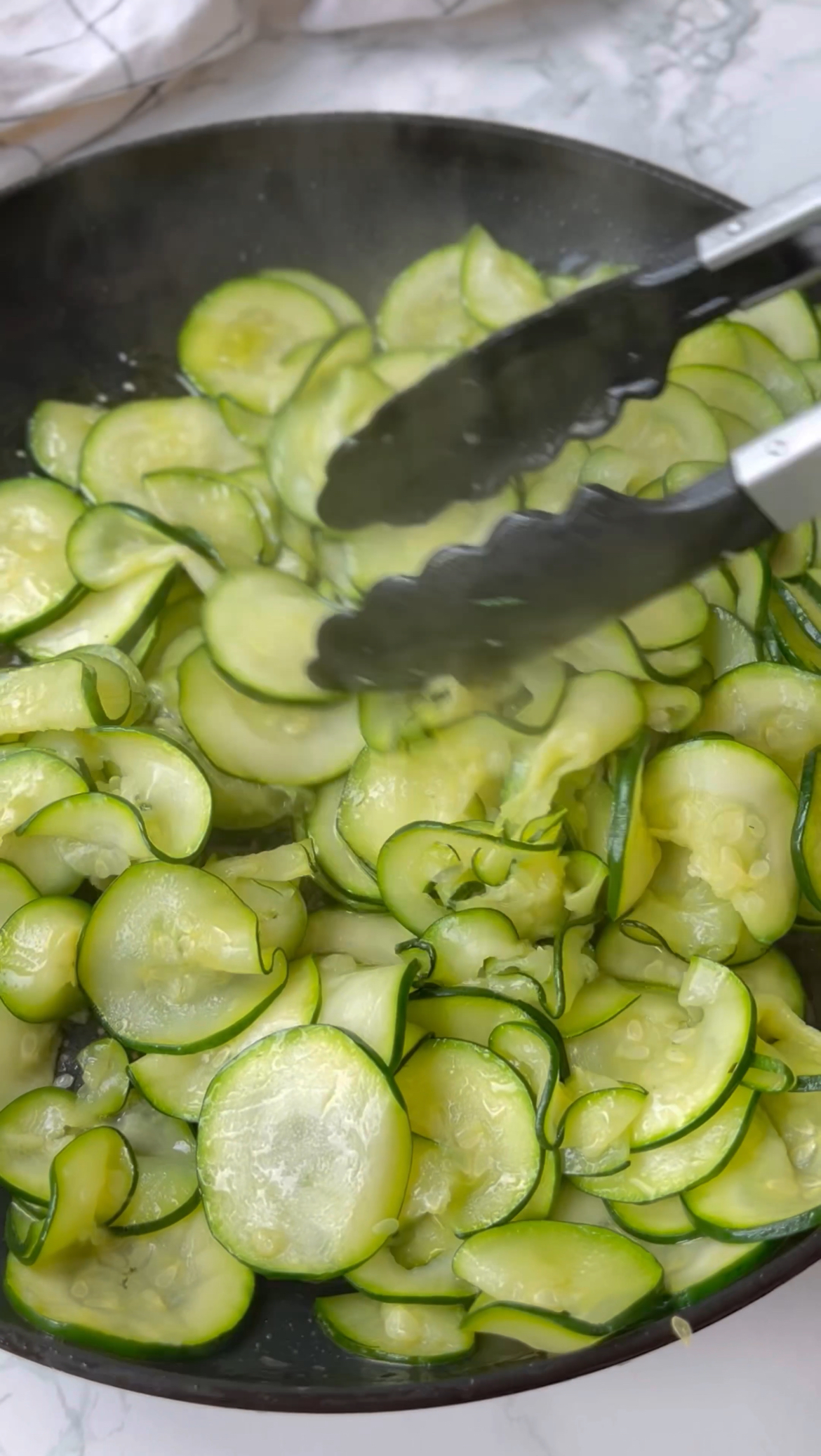 frying courgettes for spaghetti alla nerano