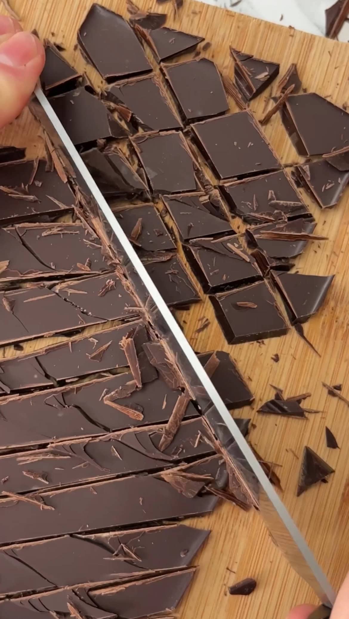 chopping chocolate for the cookies.