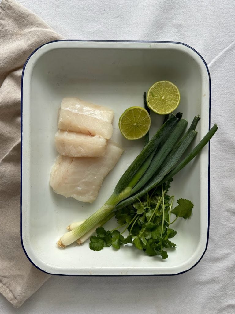 Ingredients for Thai Fish Cakes in a baking dish.