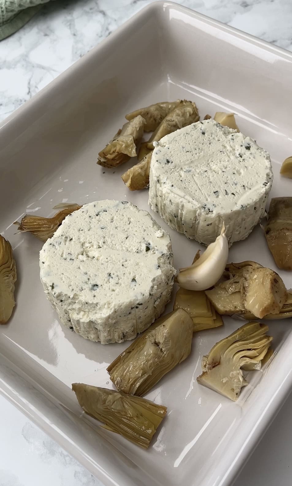 baking boursin and artichokes.