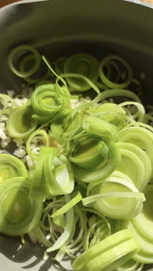 sliced leeks in a large pan