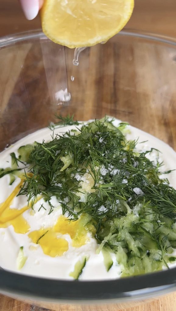 ingredients for tzatziki in a glass bowl