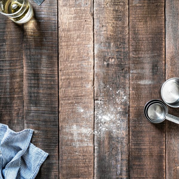 baking on a wooden board with flour and eggs