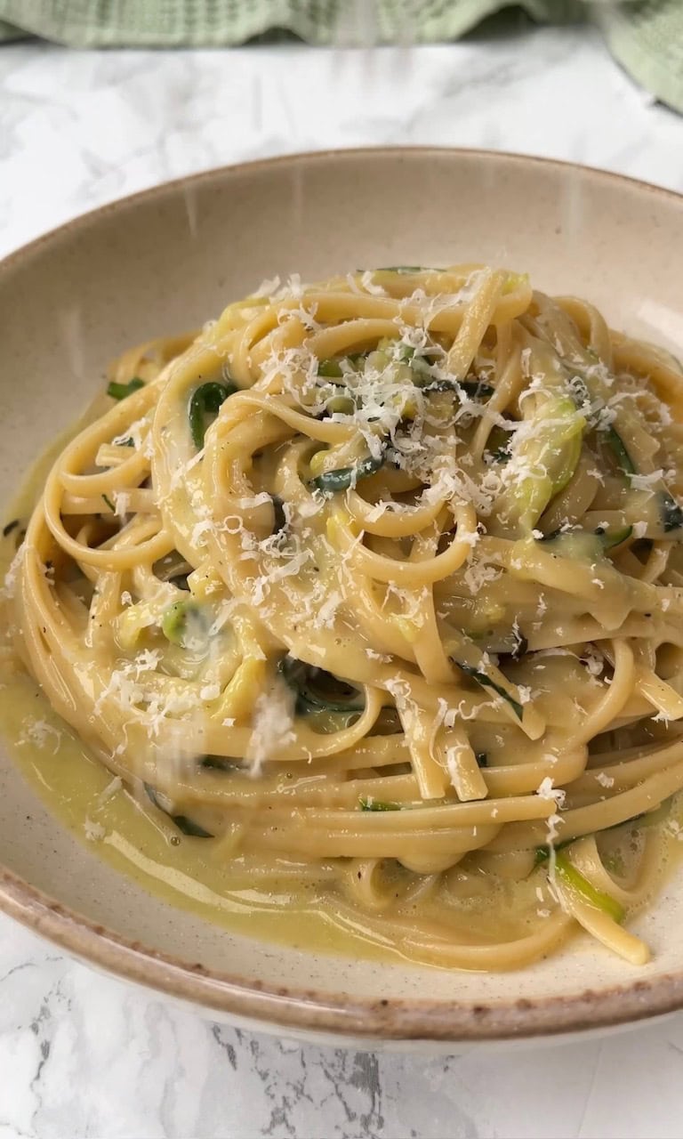 grating pecorino on courgette carbonara.