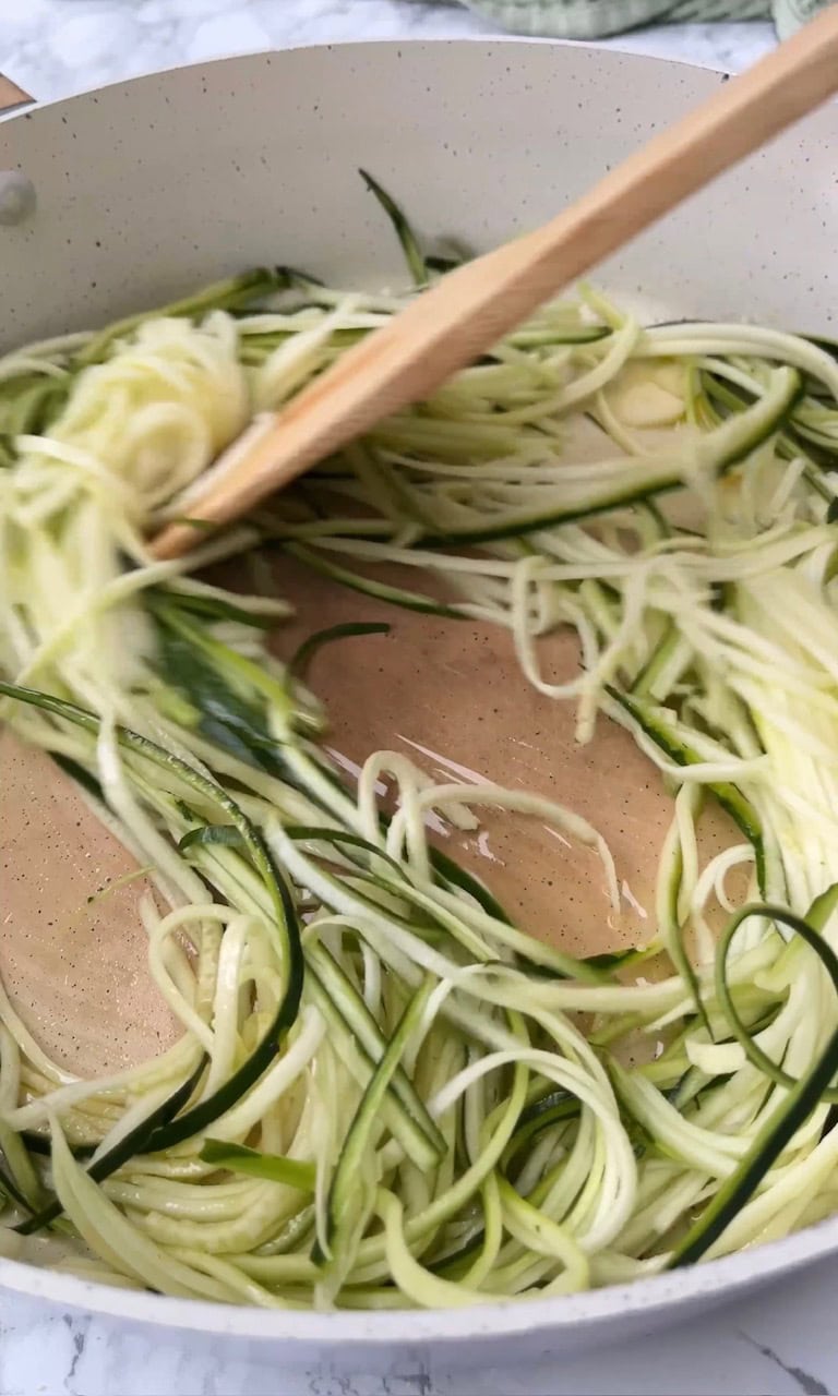 frying courgettes in olive oil.