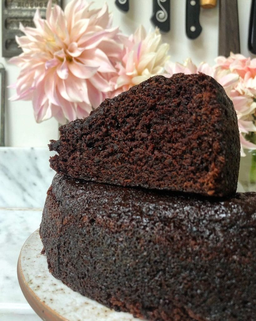 Slice of moist chocolate cake from the side