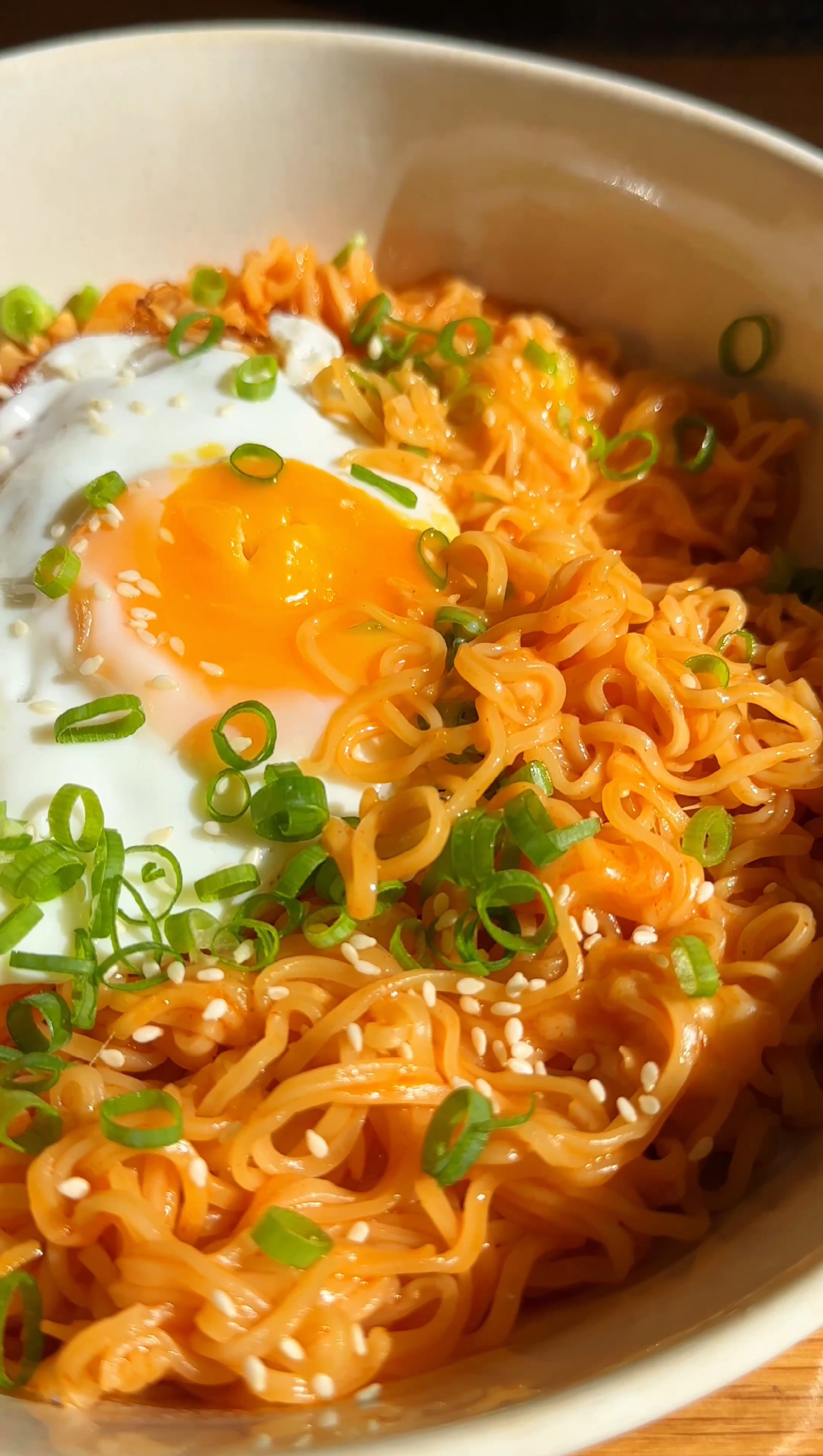 Korean Spicy Ramen Noodles with cheese and a fried egg on top