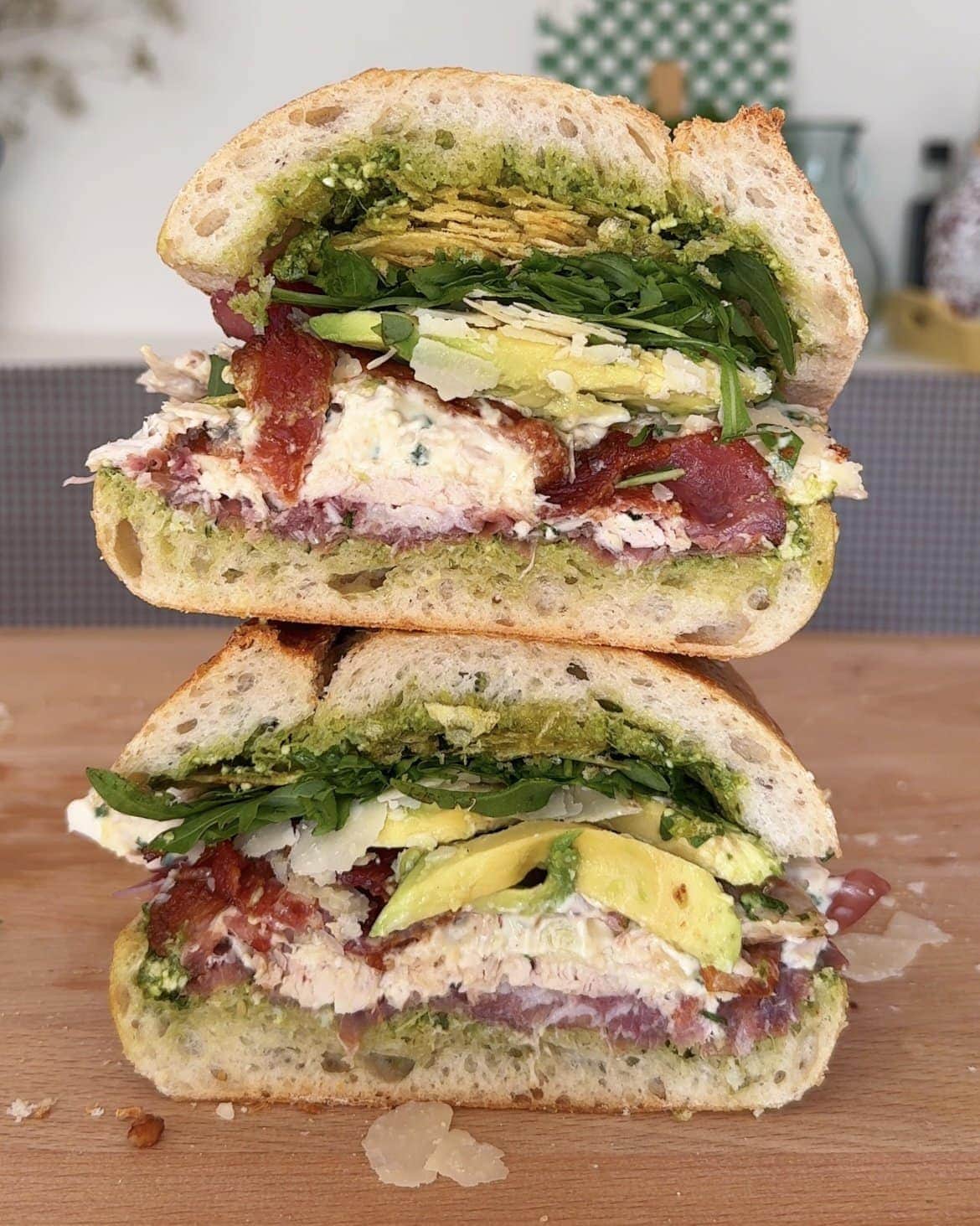 stack of chicken mayonnaise sandwich on wooden board