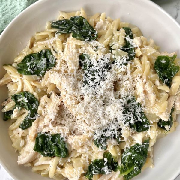 lemon chicken orzo in a white bowl