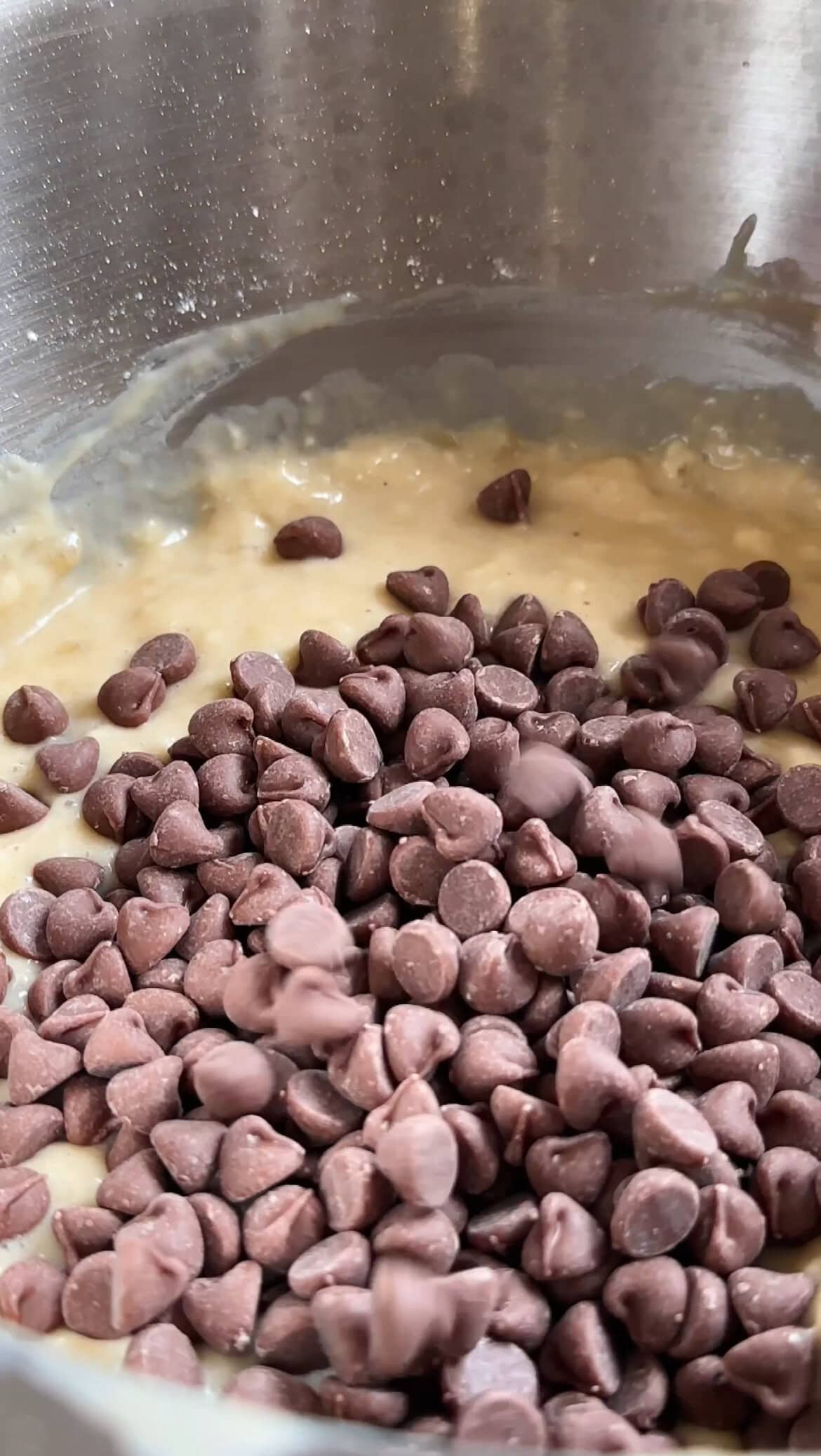 folding in chocolate chips to the batter.