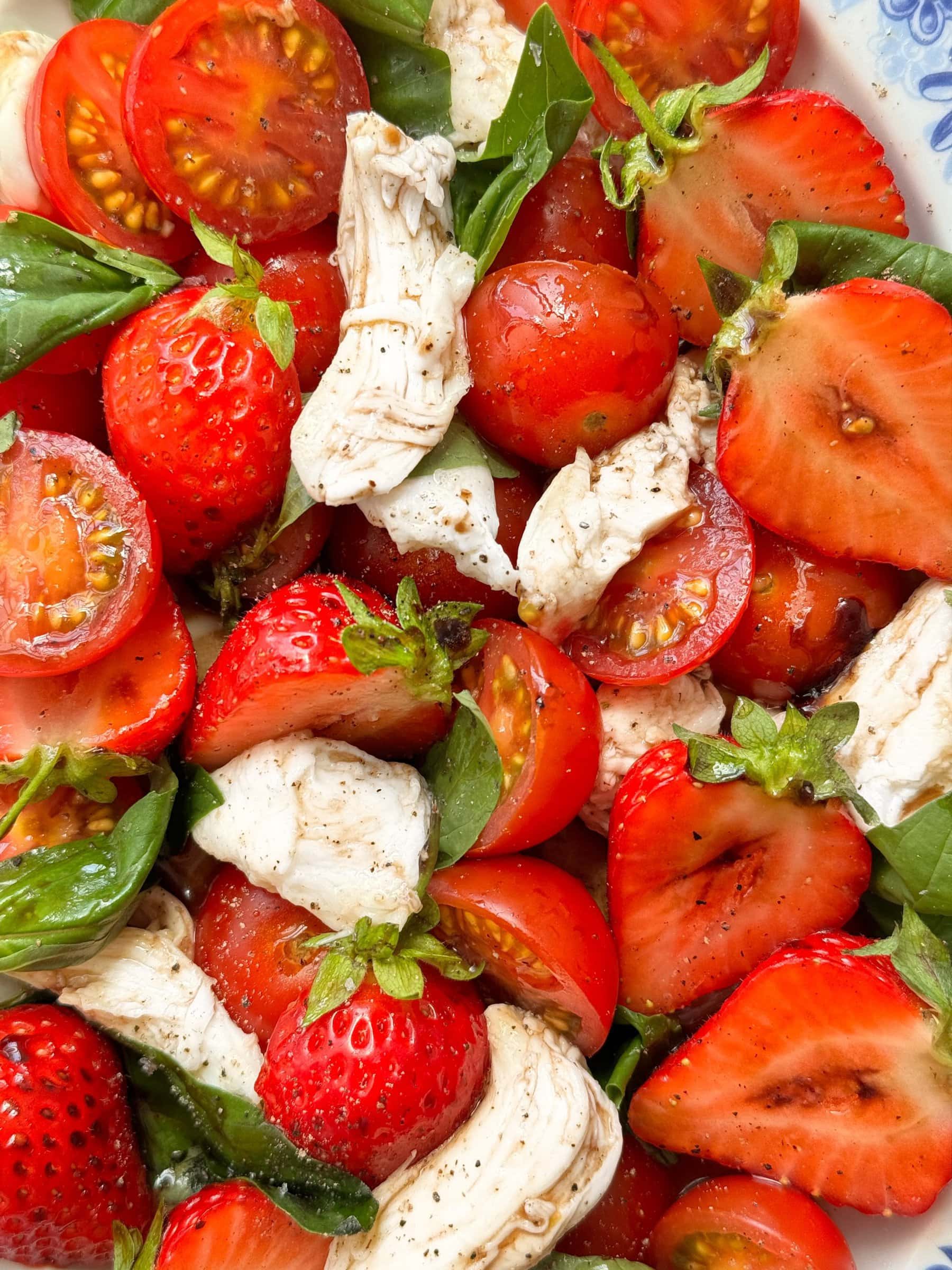 close up of strawberry and tomato salad