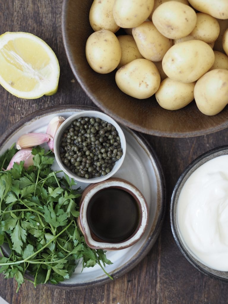 Ingredients to make hasselback new potatoes, salsa verde and labneh.