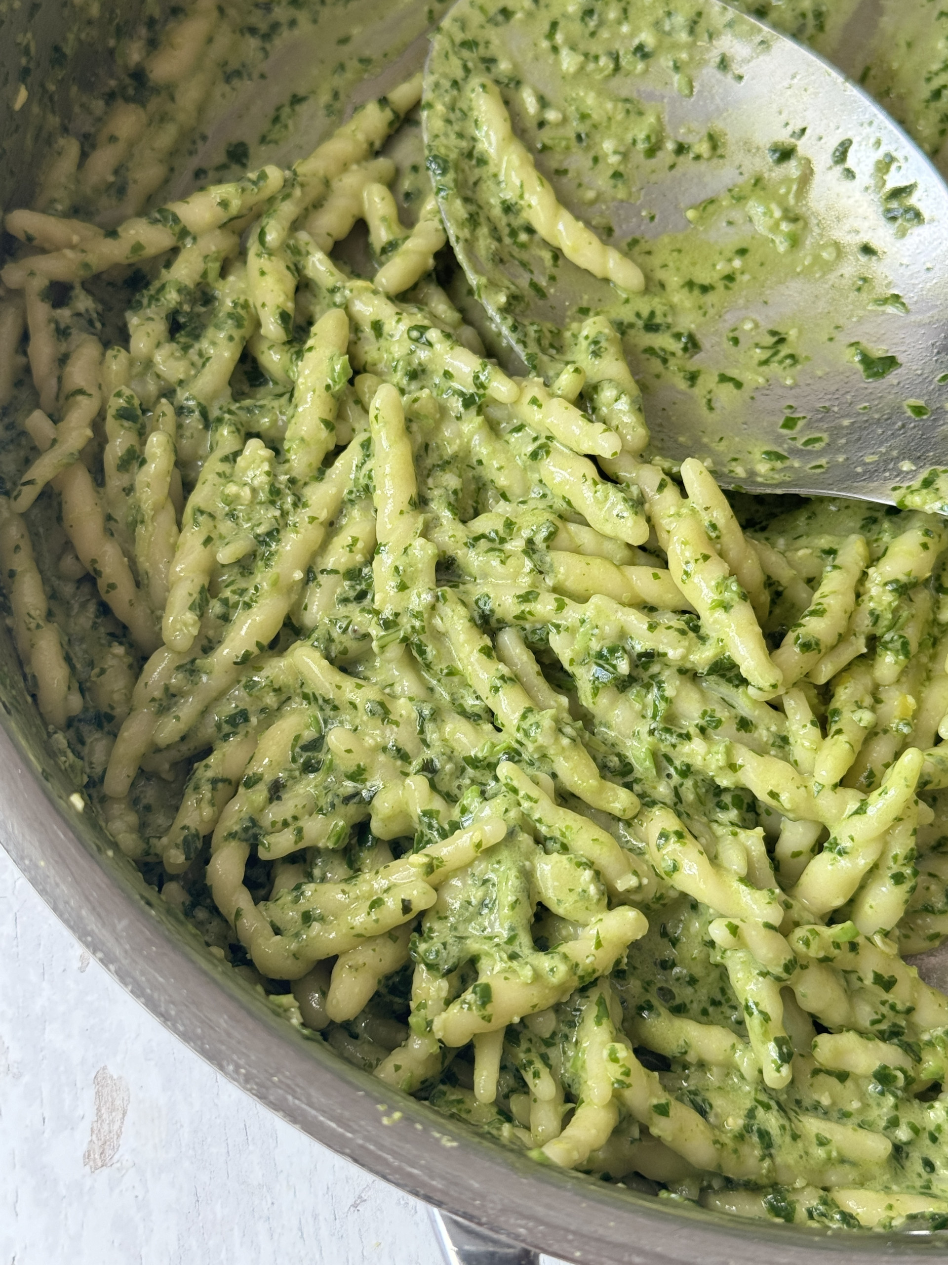 pasta al pesto in steel pan