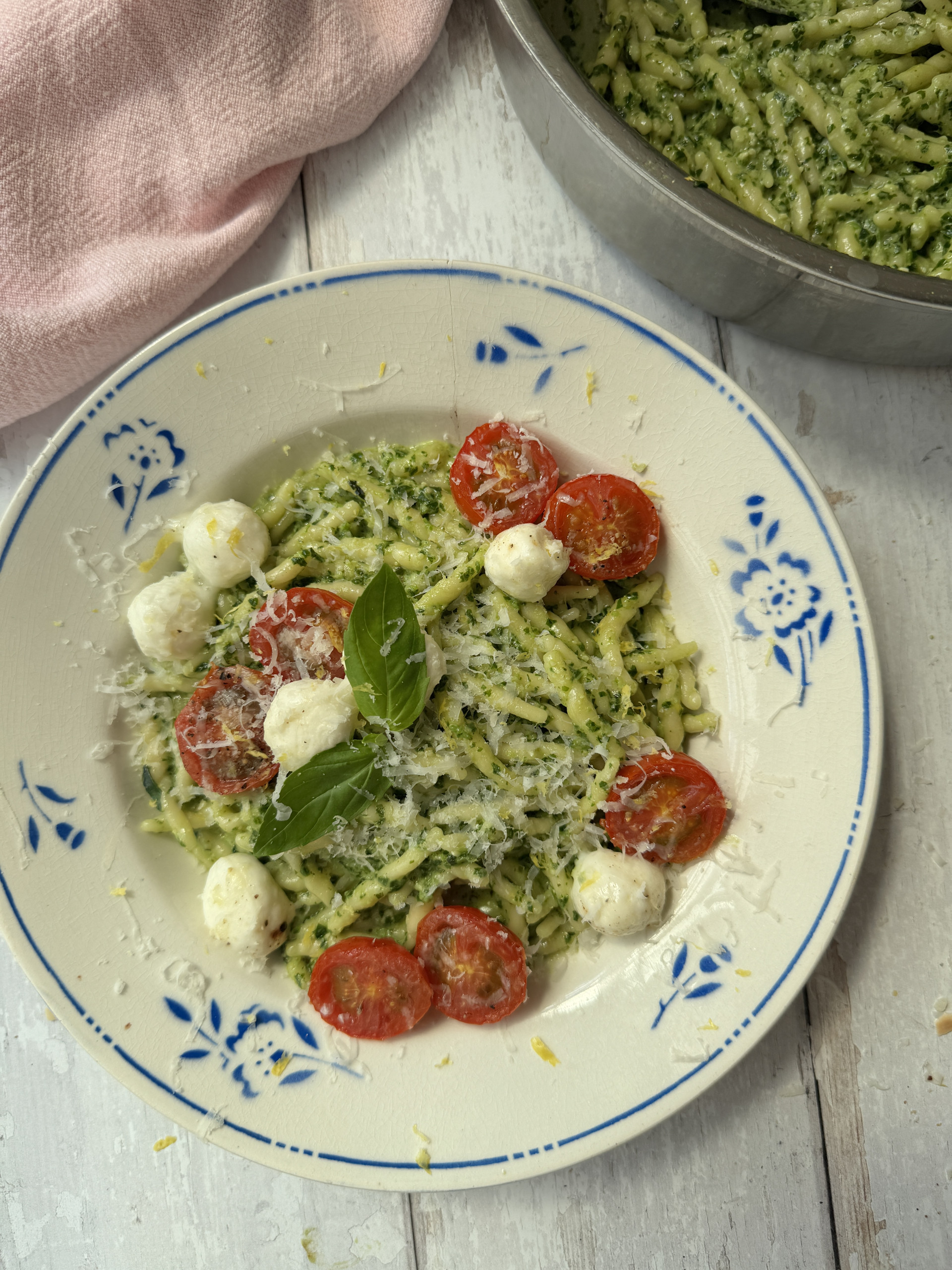 pasta al pesto in a white bowl