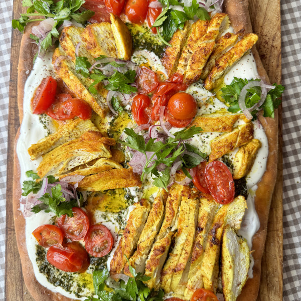 chicken flatbread on wooden board