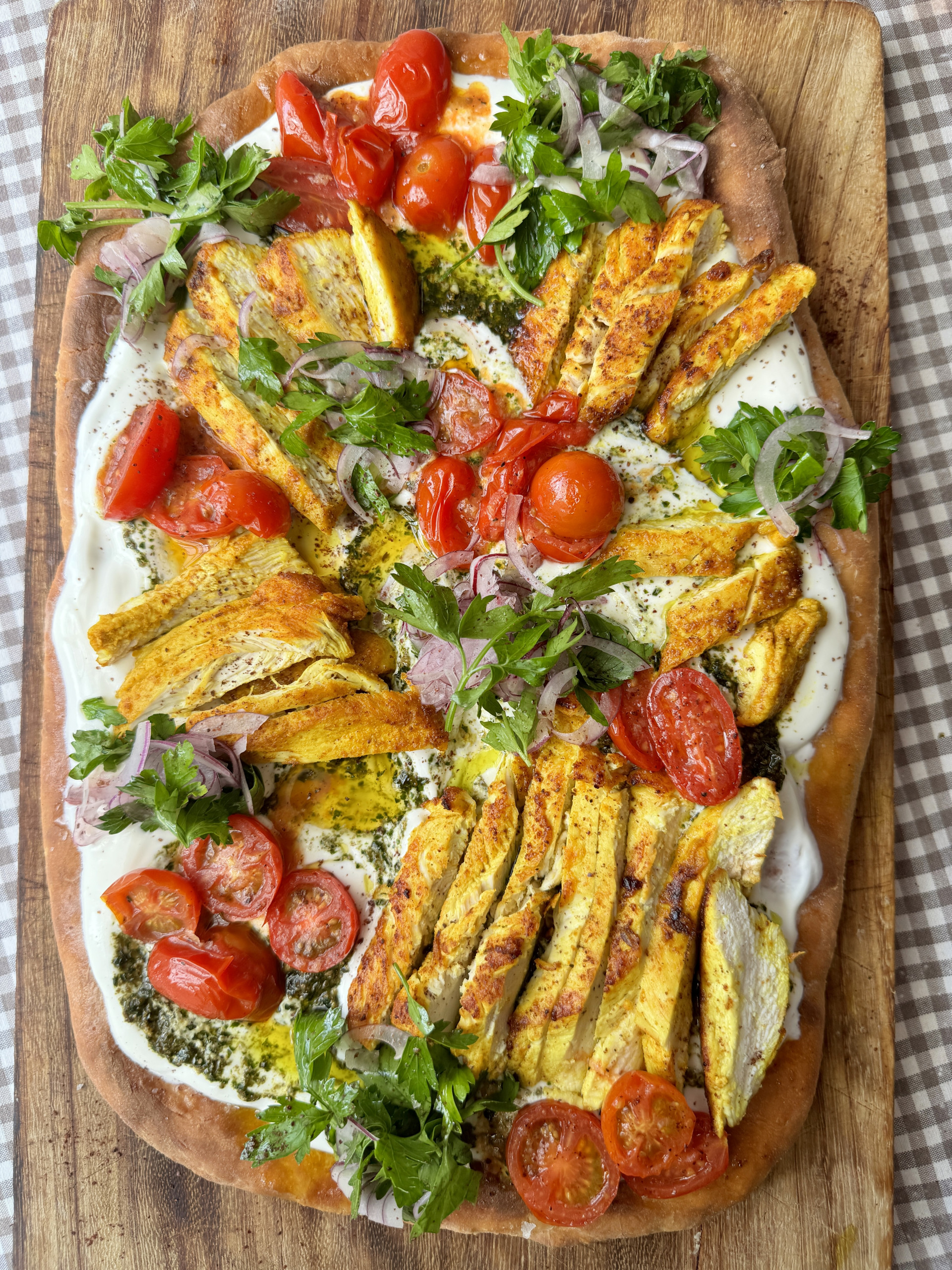 chicken flatbread on wooden board