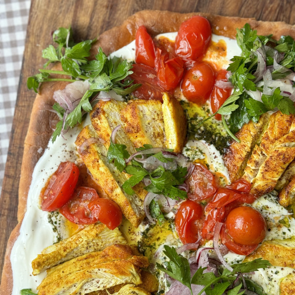 chicken flatbread on wooden board