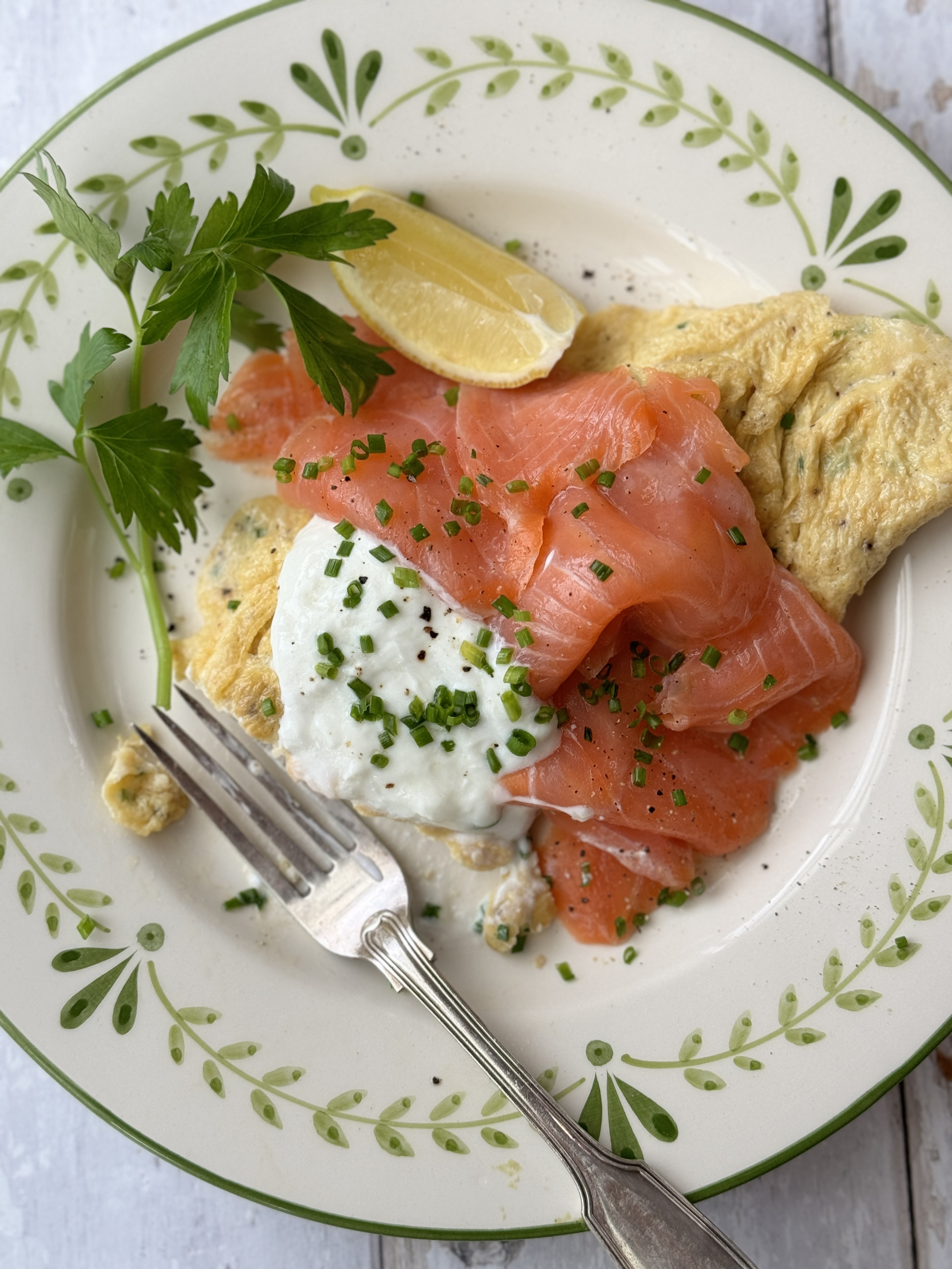 salmon omelette on white plate