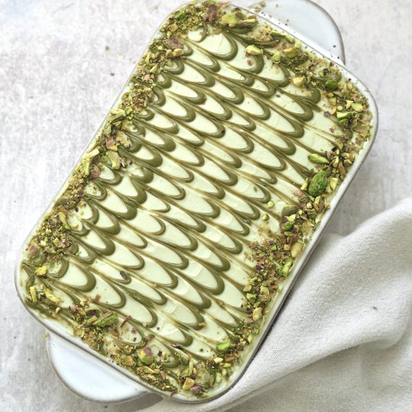 pistachio tiramisu in white dish