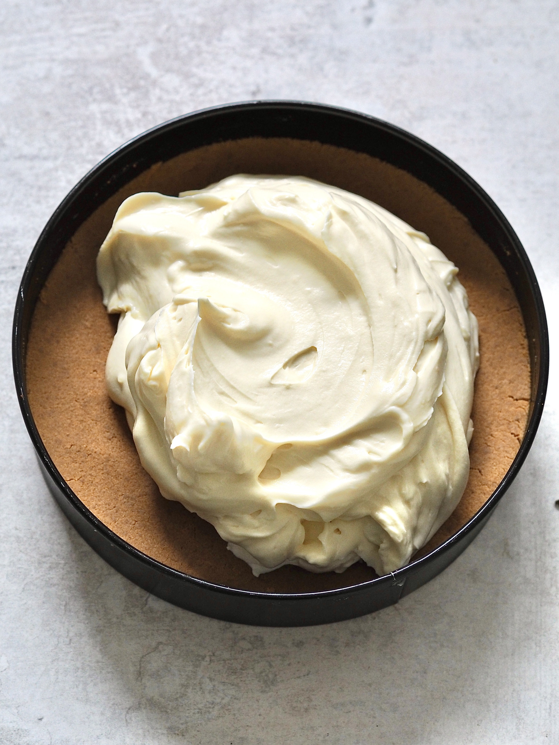 passion fruit cream topping on the cheesecake base