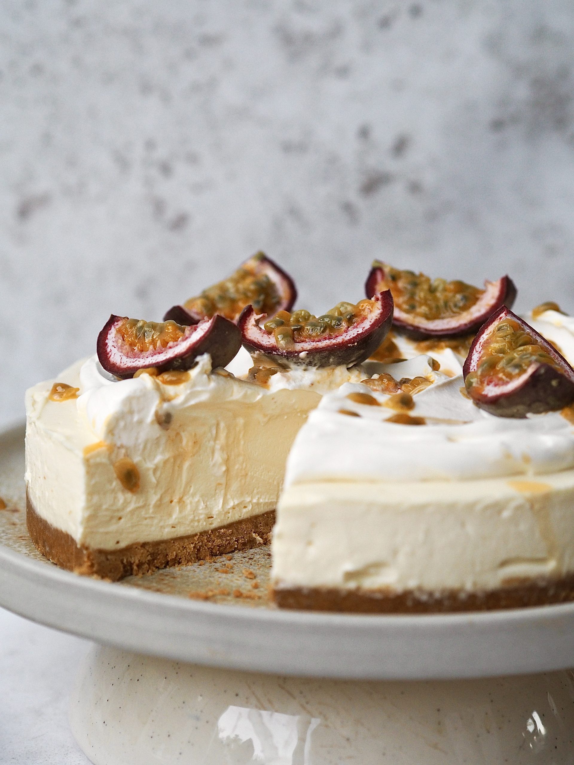 White Chocolate and Passion Fruit Cheesecake with slice removed