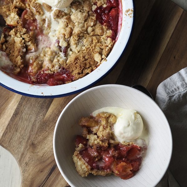 Peach Cobbler with Cake Mix in a white bowl