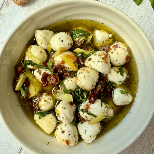 marinated mozzarella balls in a bowl