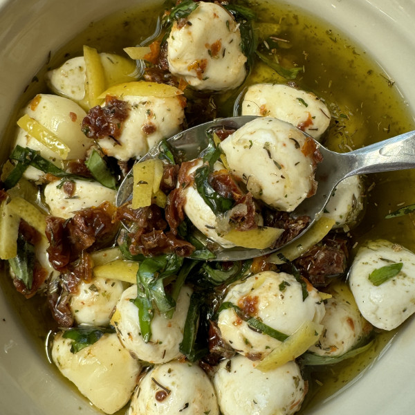 marinated mozzarella balls in a bowl