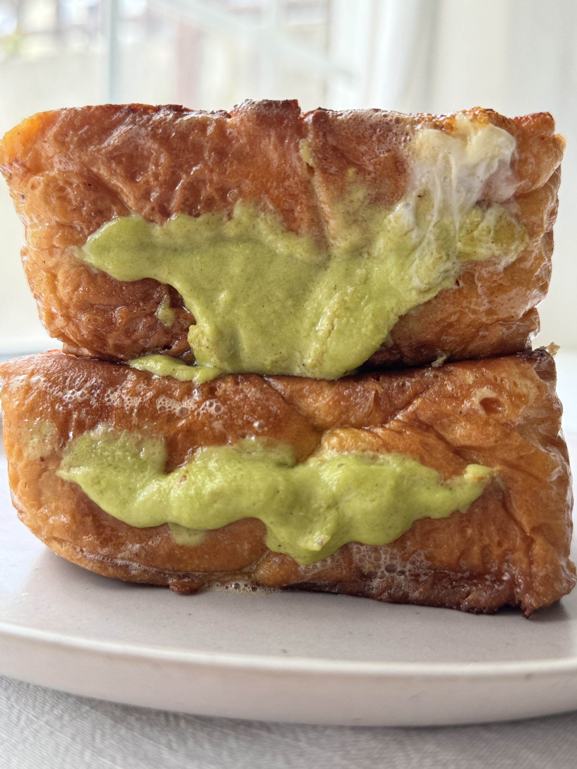 pistachio cream in pistachio filled brioche french toast