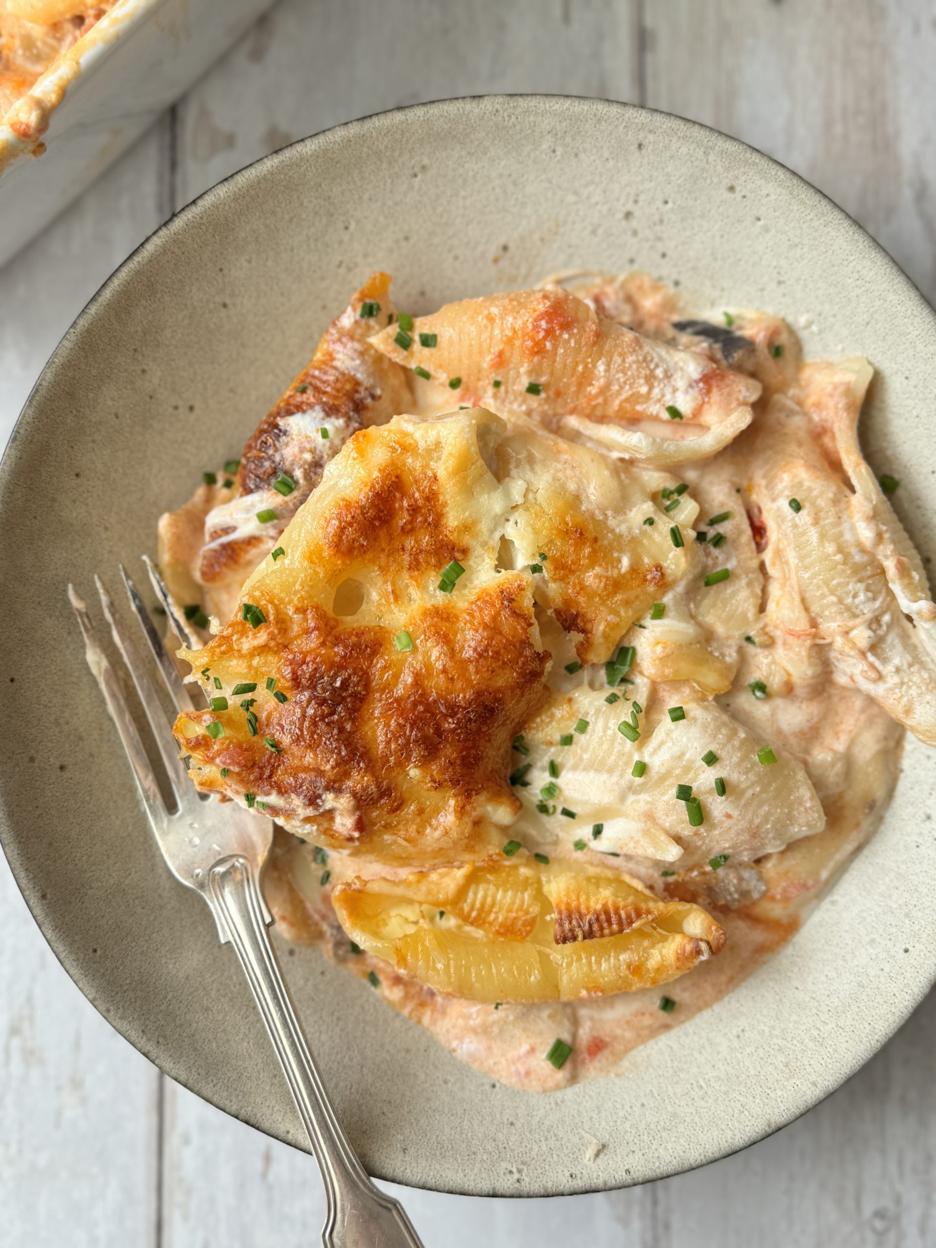 a bowl of ricotta and aubergine giant shell pasta