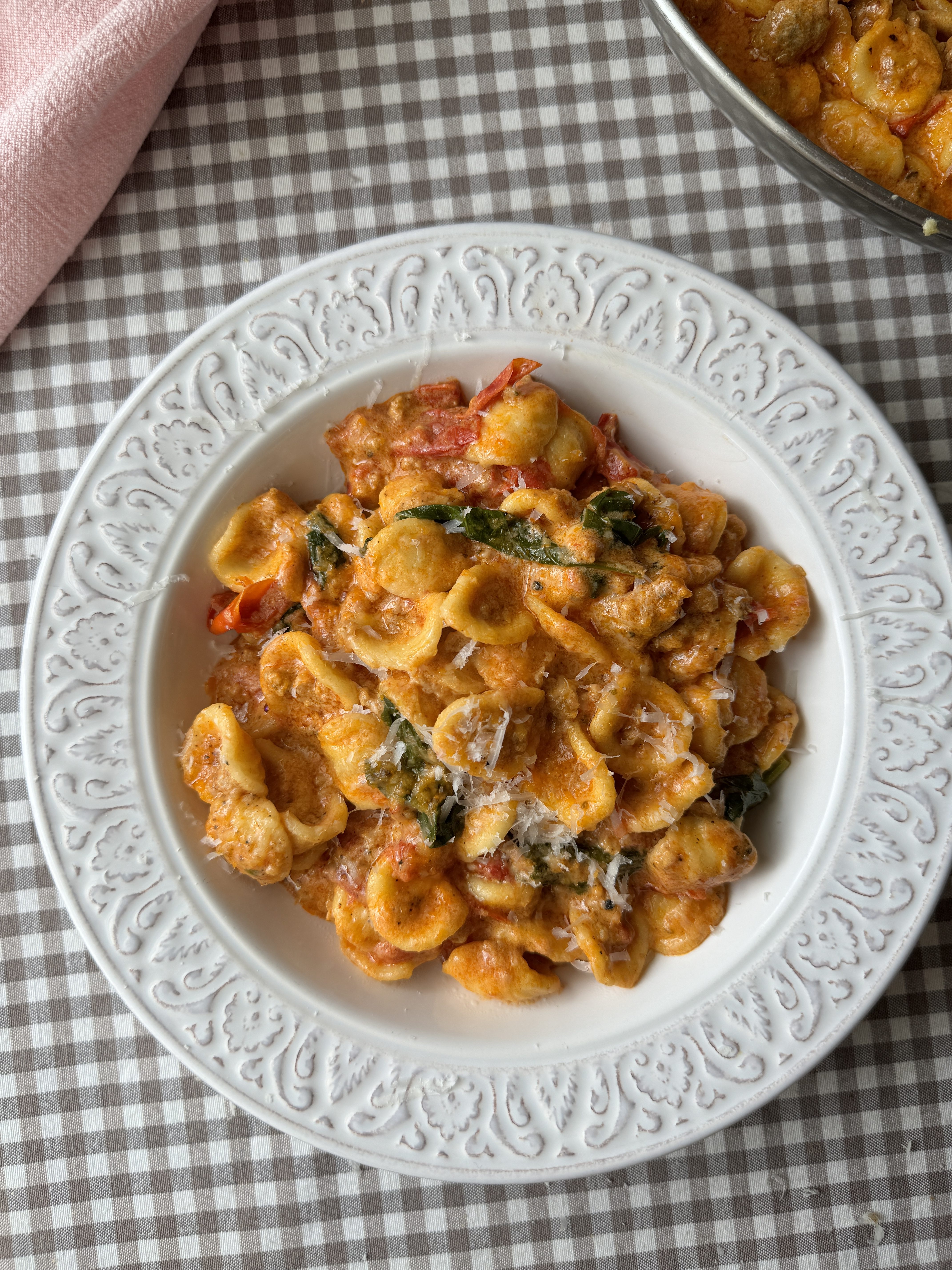 pasta con nduja in white bowl