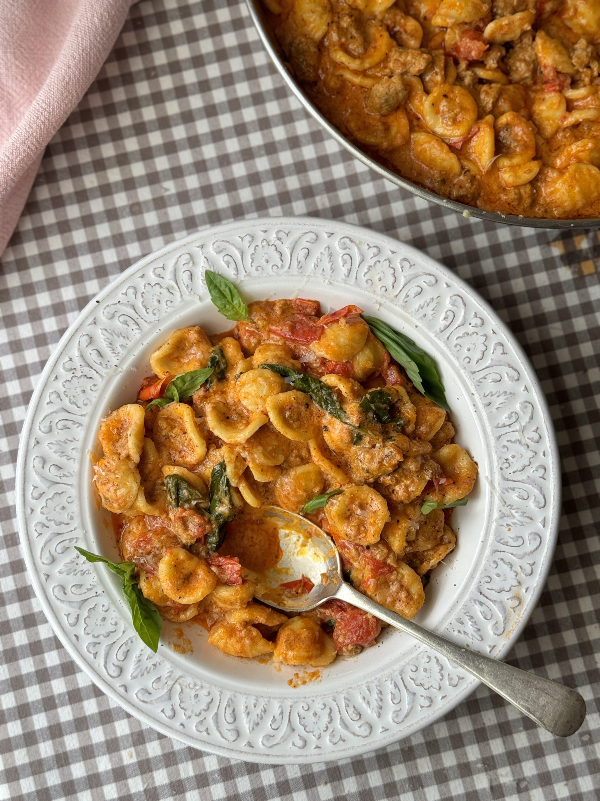 pasta con nduja in white bowl