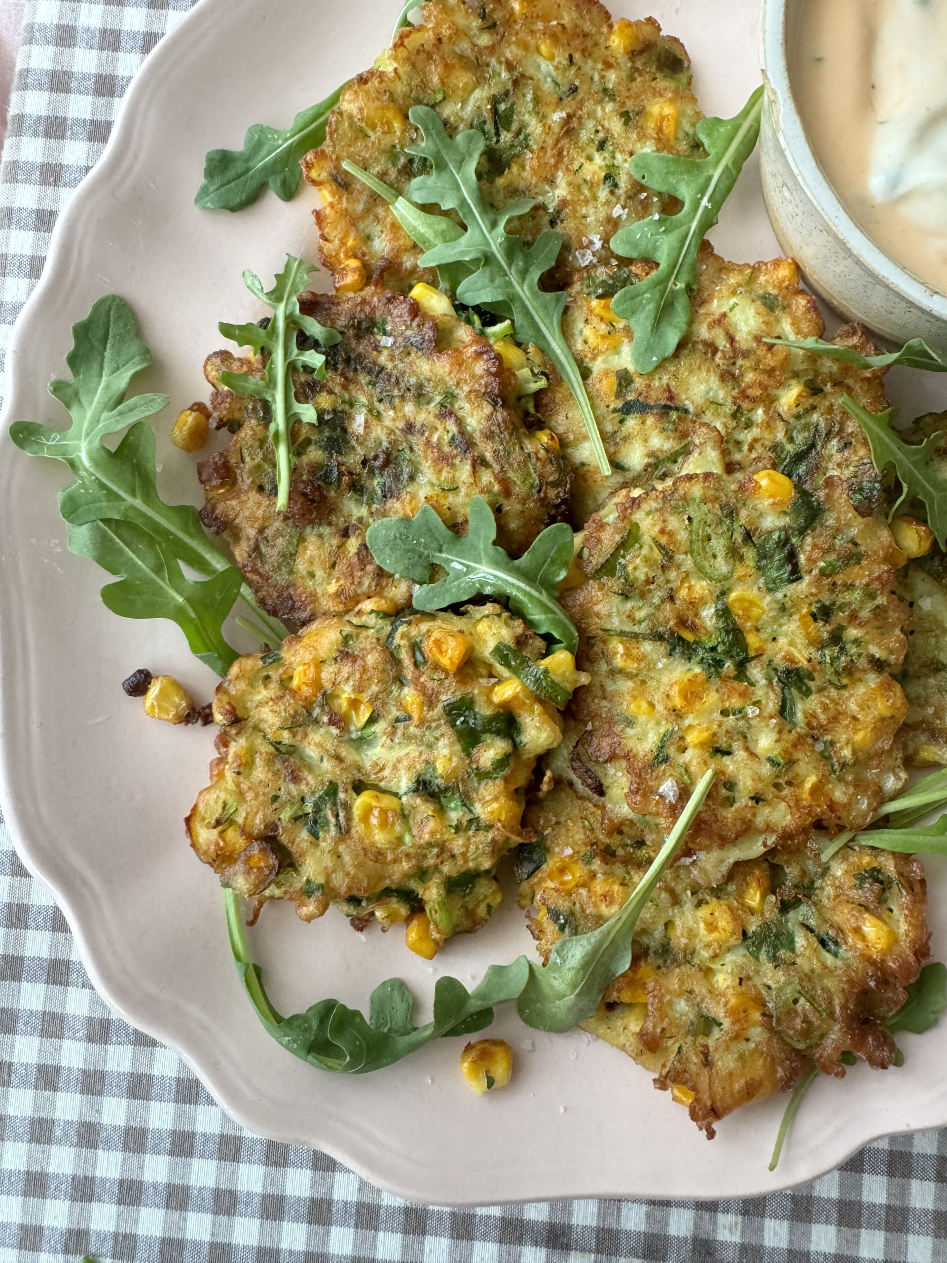 courgette corn fritter on a plate