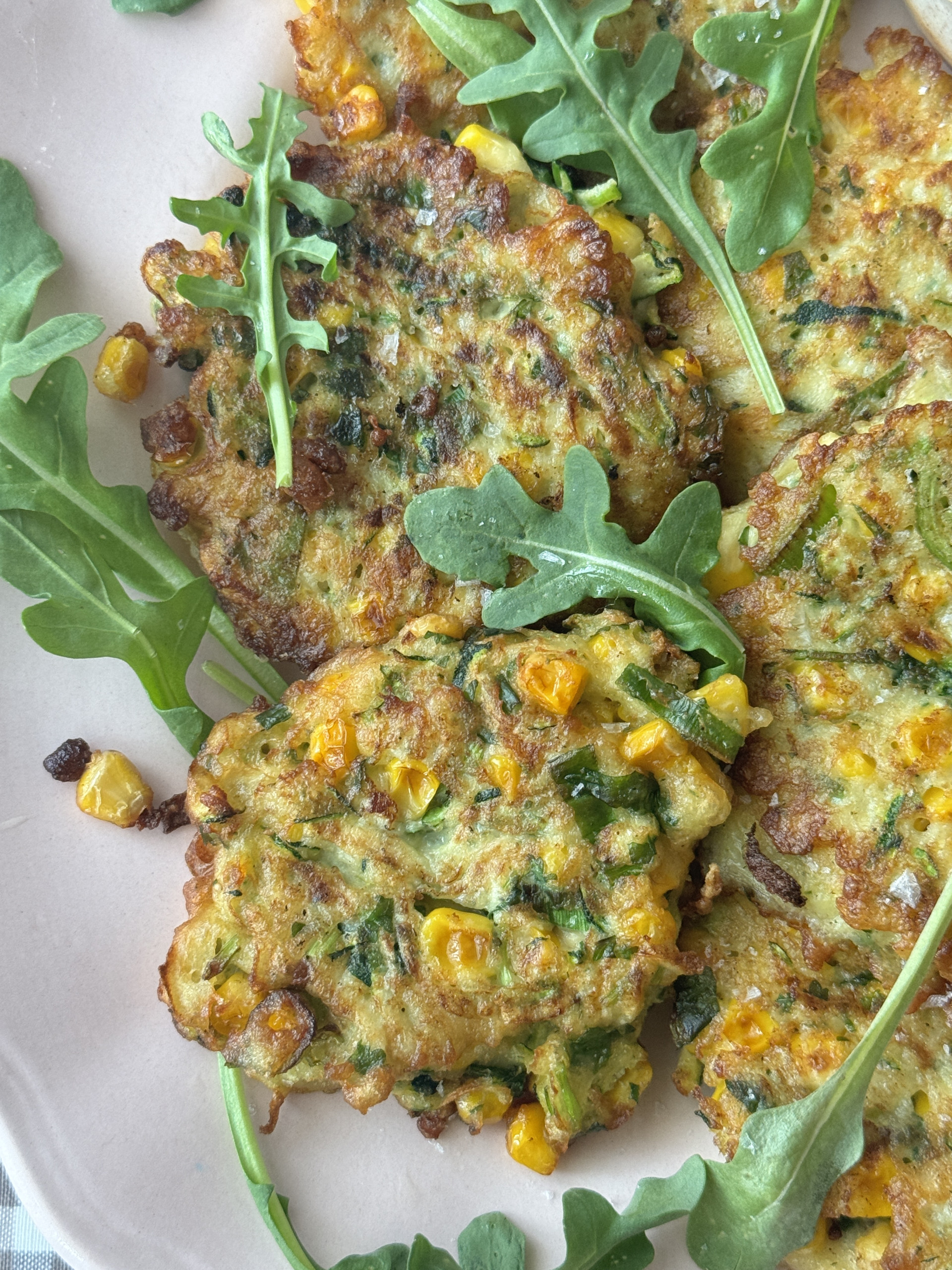 courgette corn fritter on a plate