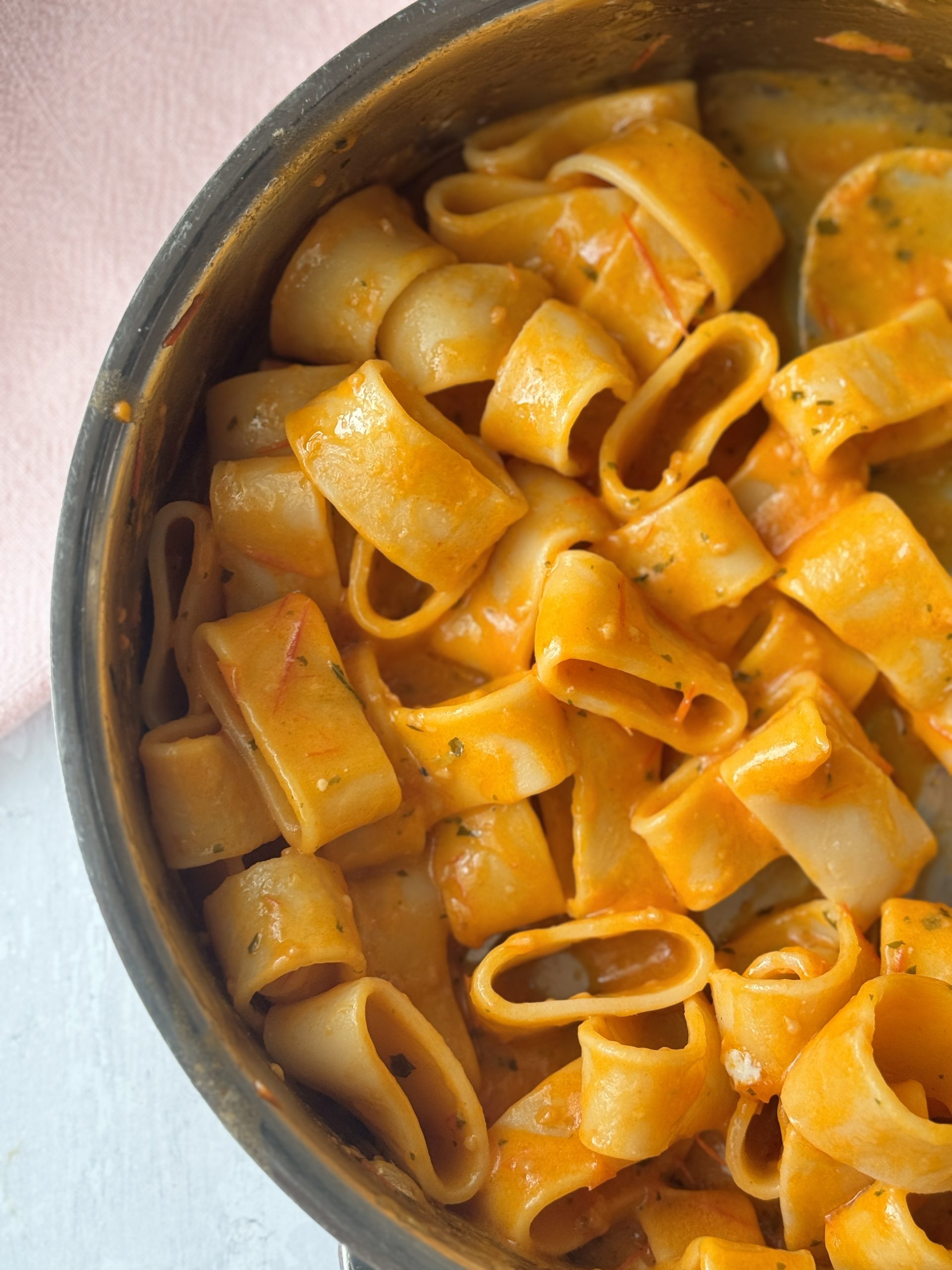 tomato butter pasta in a stainless steel pan