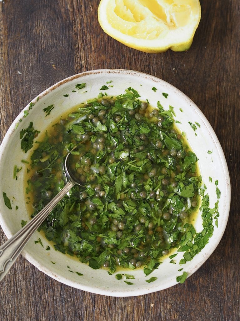 Salsa verde in a white bowl.