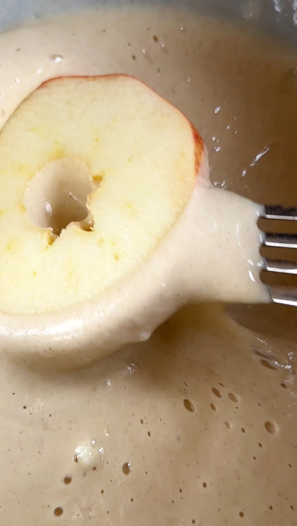 covering apple slices in batter