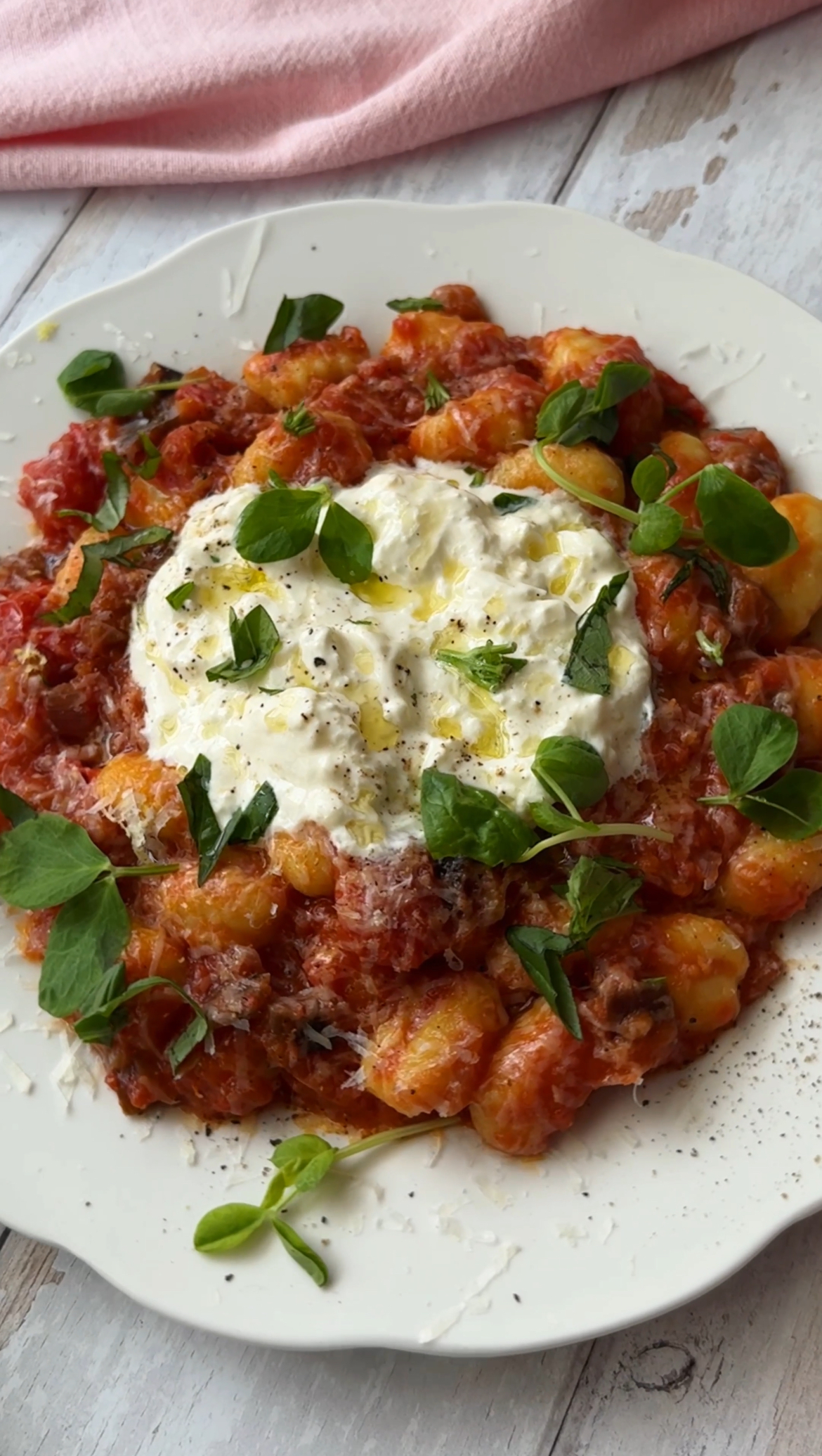 gnocchi alla norma on a white plate