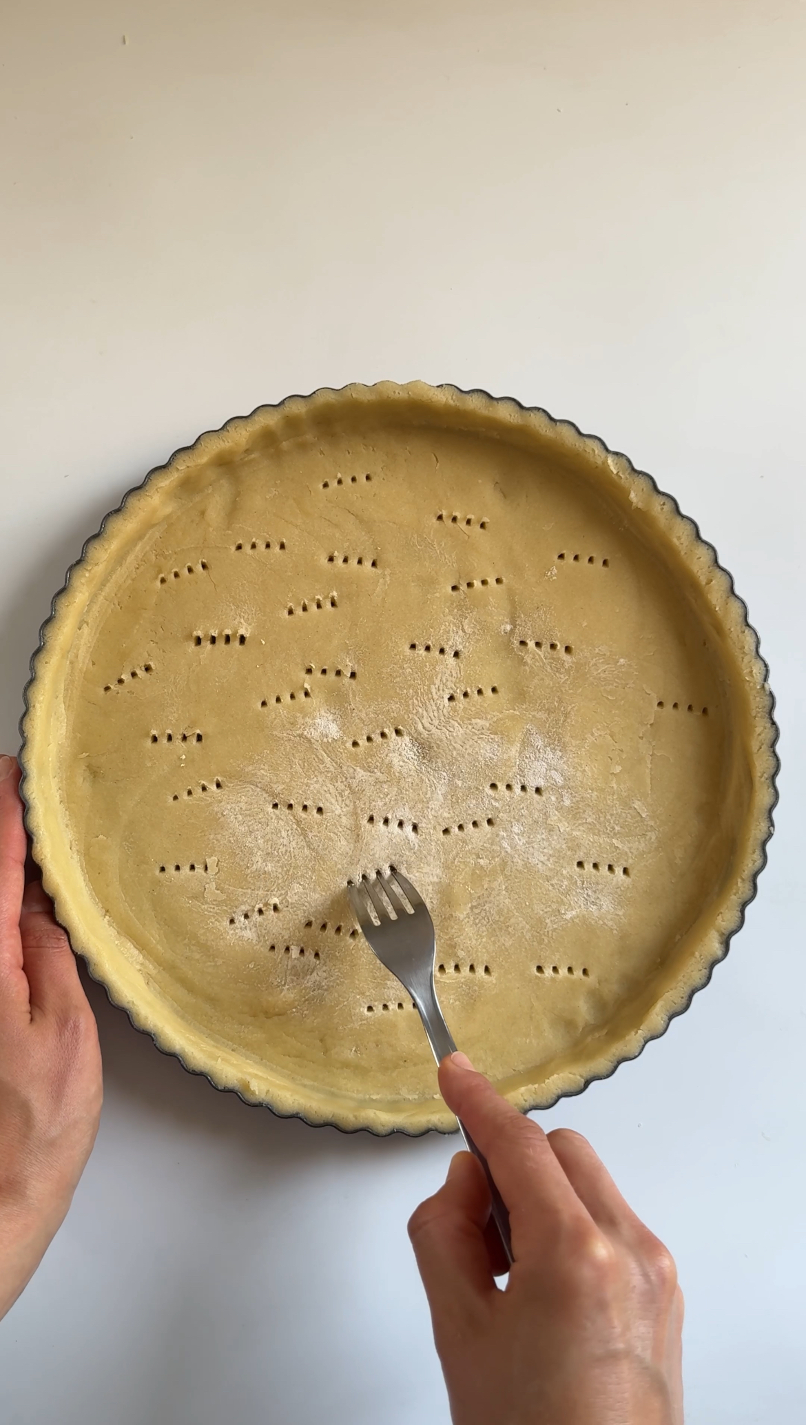 pricking pastry for lemon meringue tart