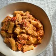spicy tuna pasta in a white bowl