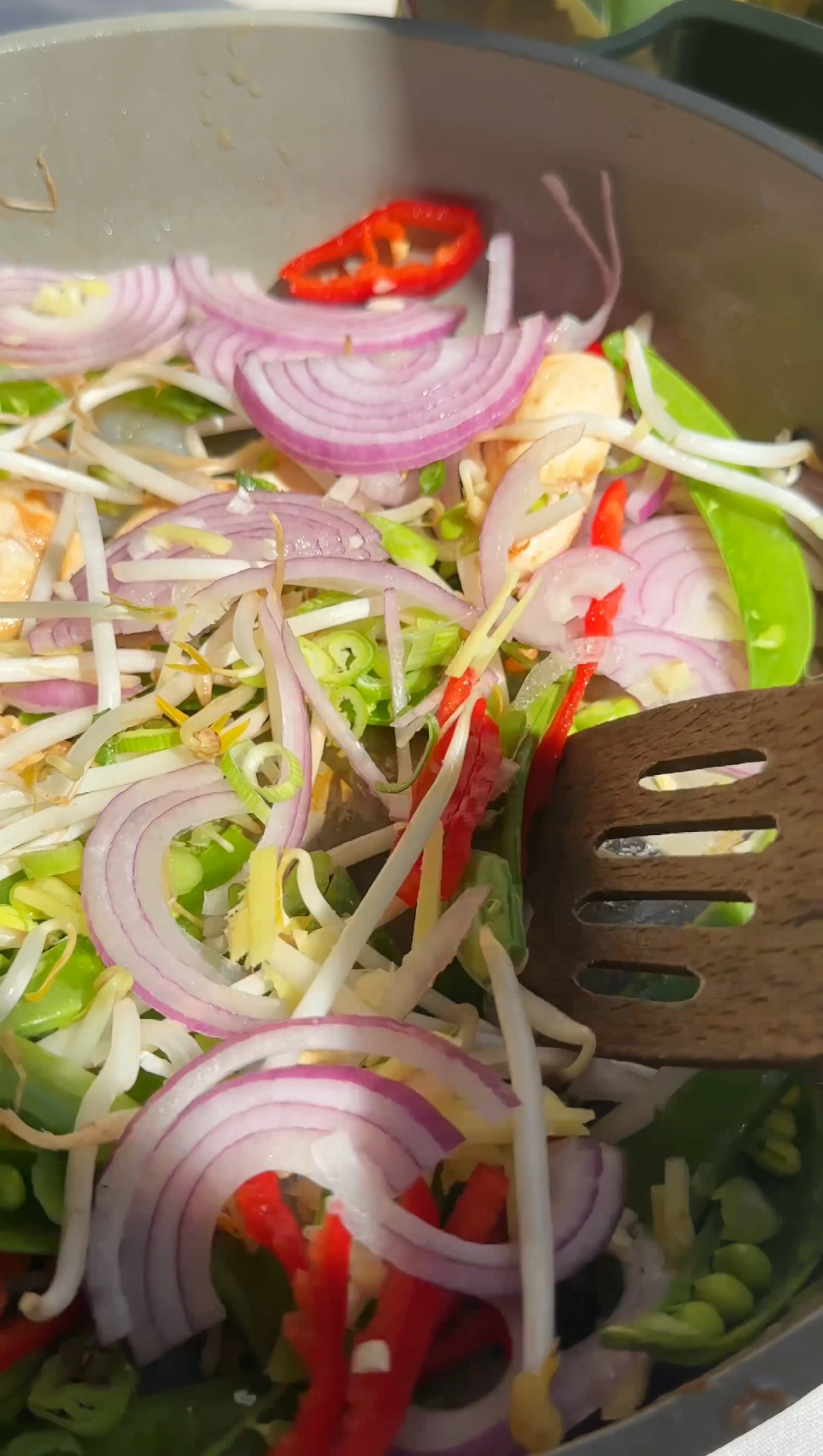 frying vegetables for pad thai