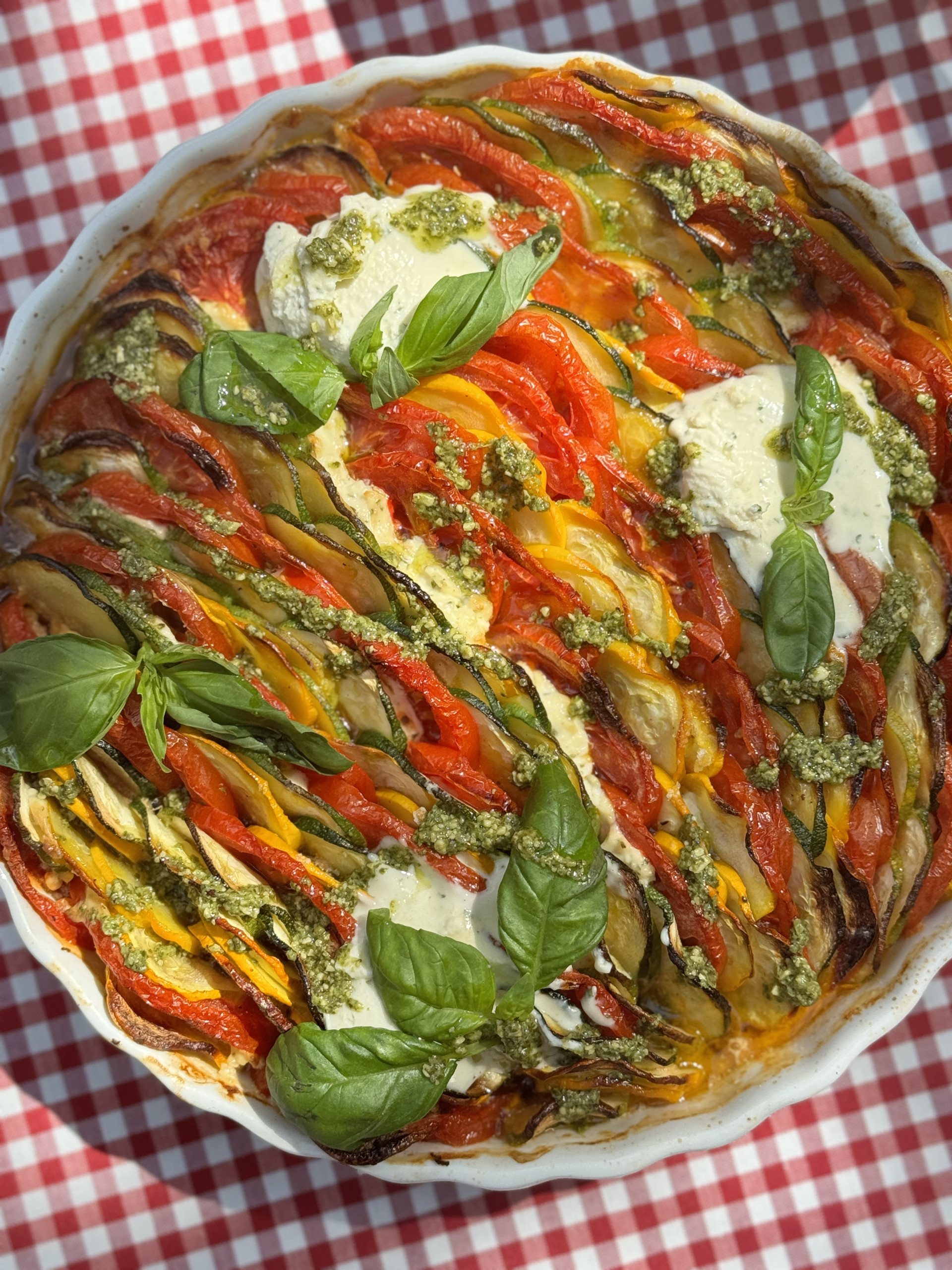 courgette gratin with tomato and basil.