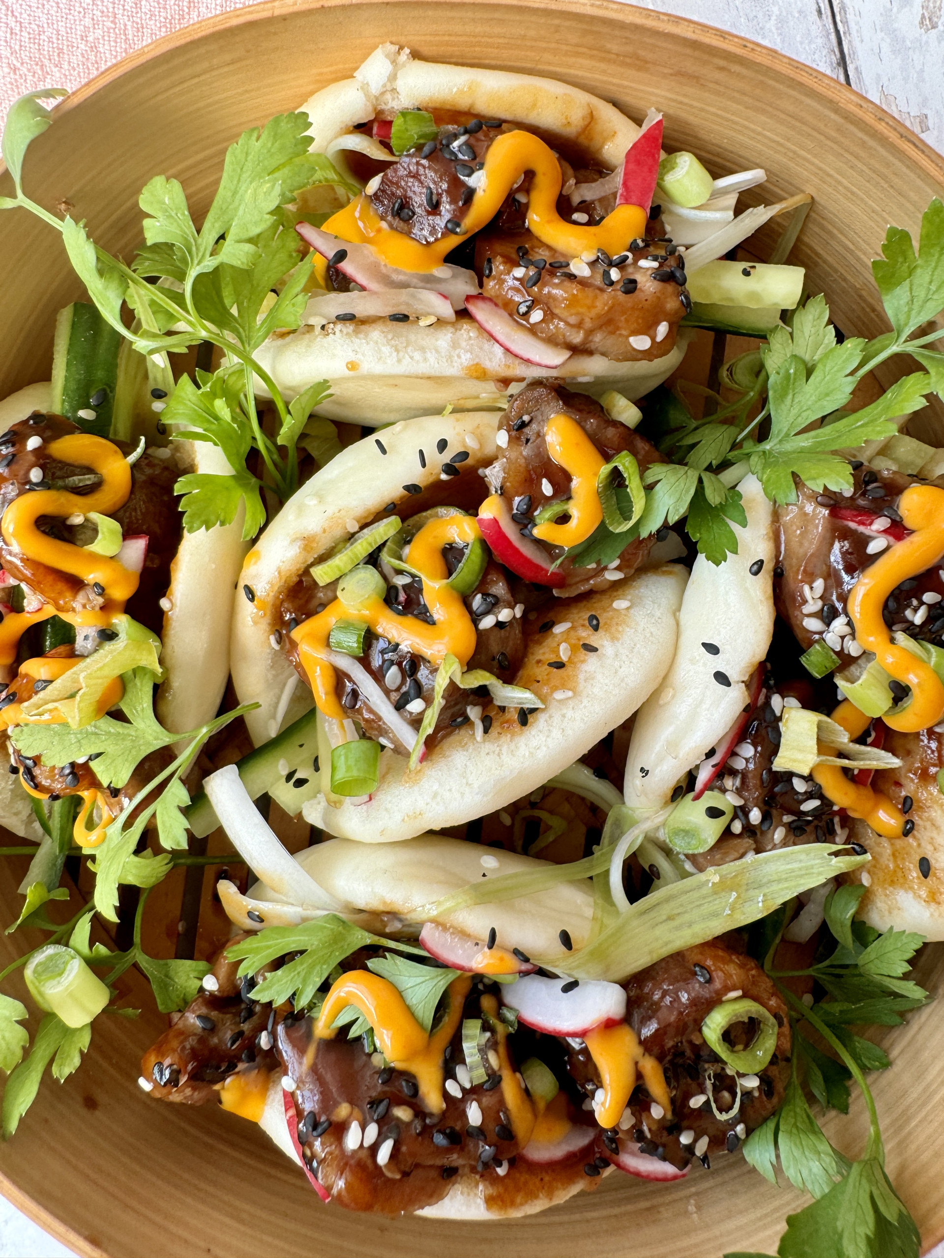 plate of duck bao buns.