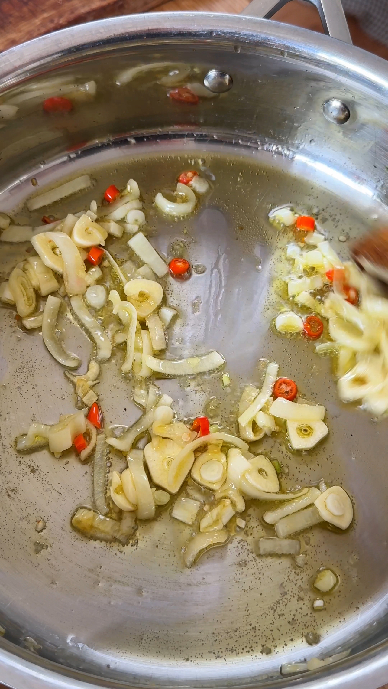 step one for crispy parmesan chicken ferrying aromatics