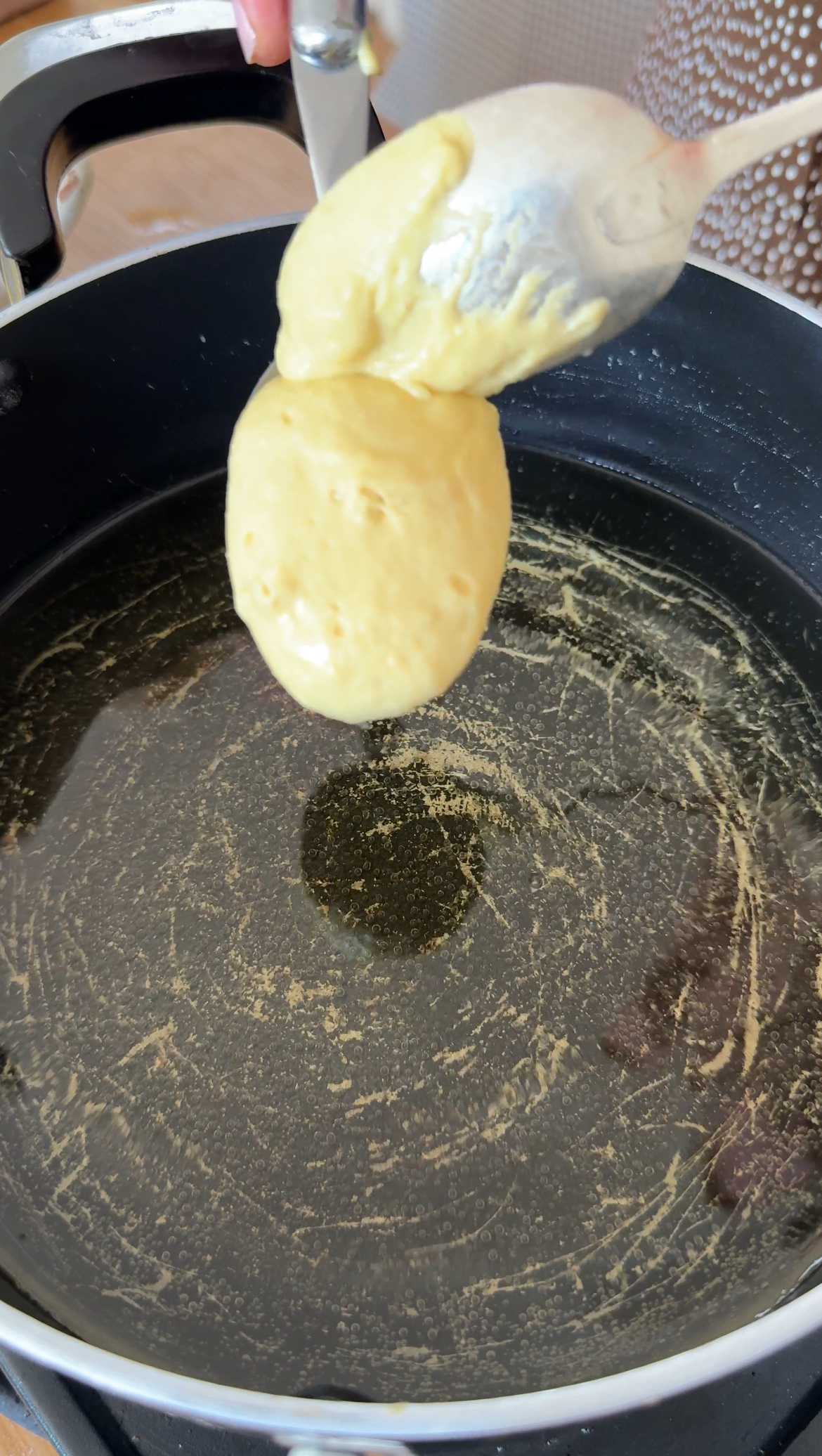 dropping batter into hot oil