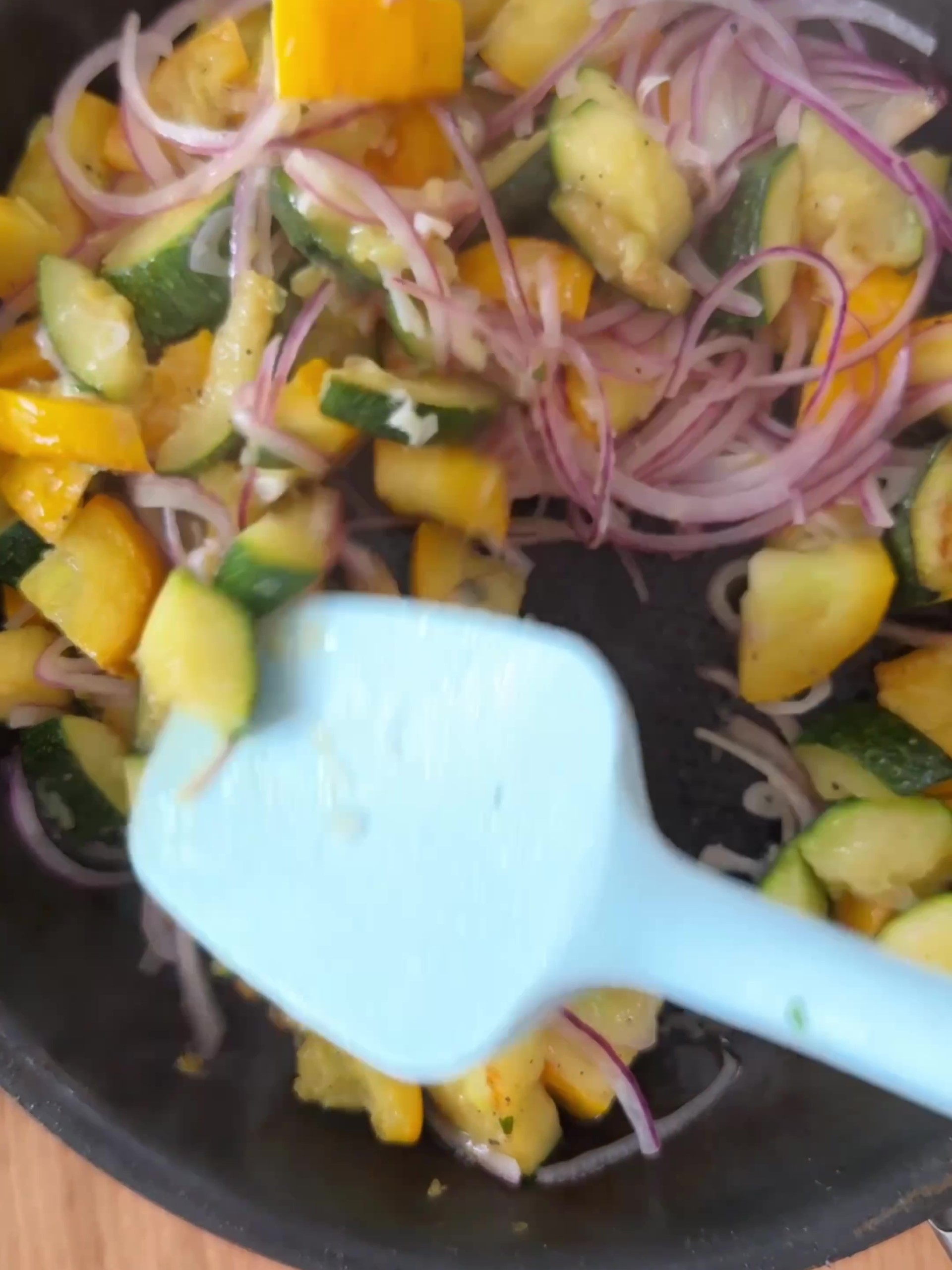 Add garlic to courgettes