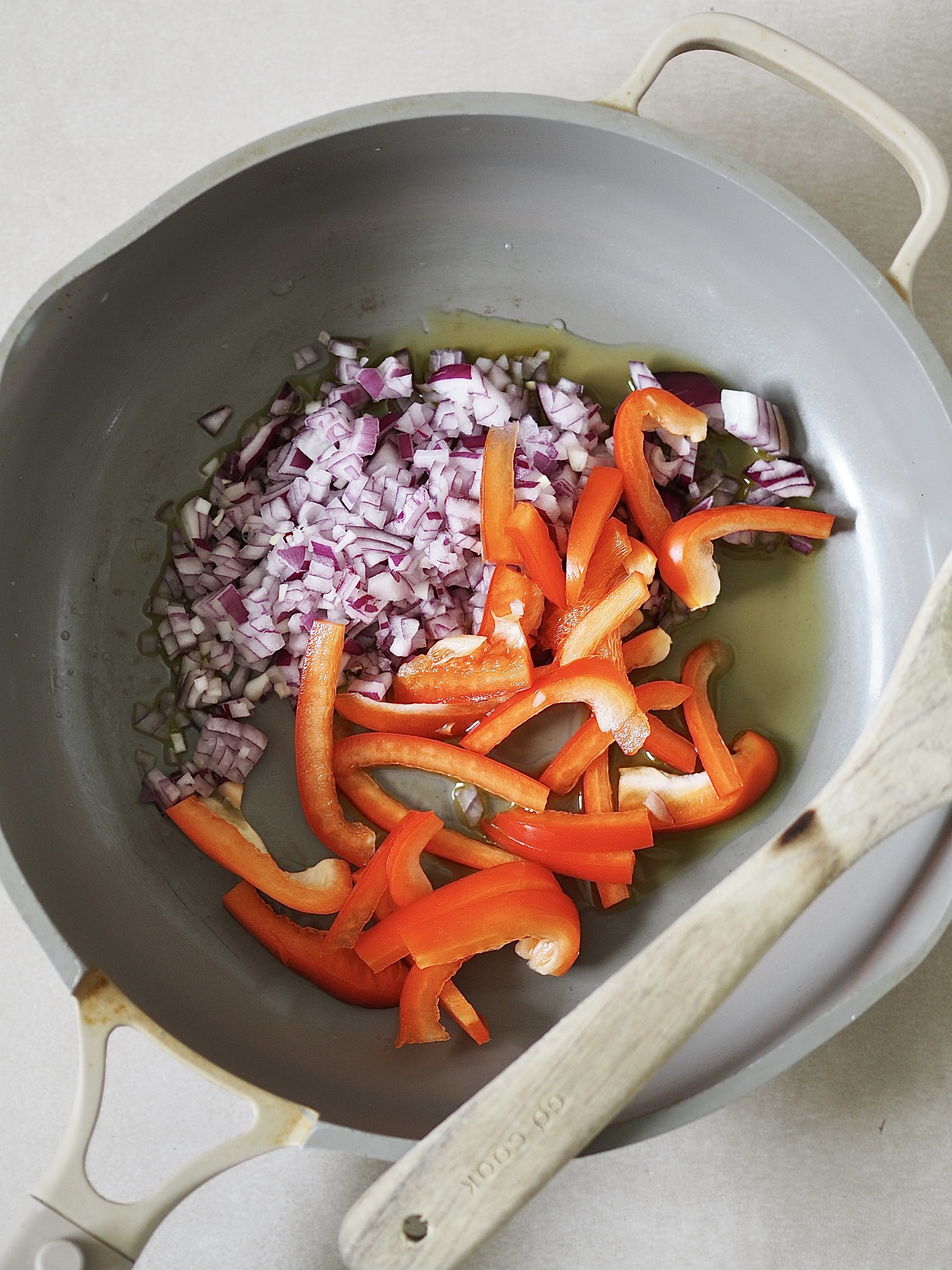 Frying peppers and onions